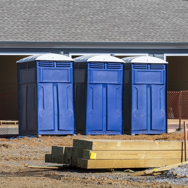 what is the cost difference between standard and deluxe porta potty rentals in Nauvoo AL